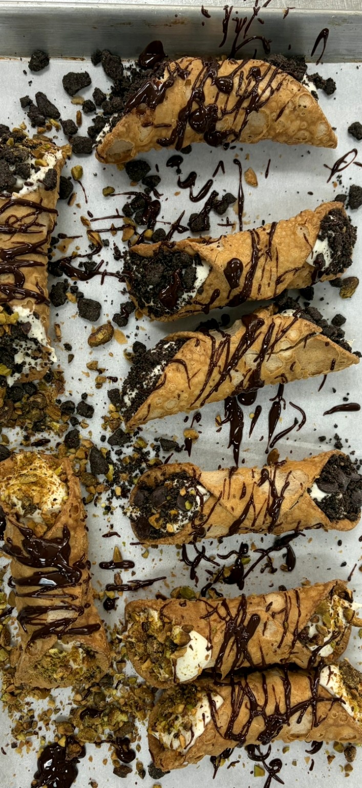 Hand-finished cannoli with pistachio & cookie crumb